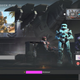 Four Spartans loaf around in the multiplayer lobby of Halo Infinite